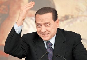 Berlusconi defender a mujeres
