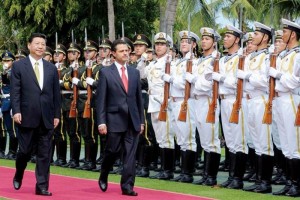 Con honores militares, Enrique Pea Nieto fue recibido en esta isla del sur de China por el presiden