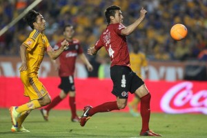 Tijuana dio un paso a la clasificaci�n tras empatar con Tigres en el Volc�n.