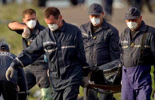 Los observadores de la OSCE contabilizaron 198 cuerpos, que fueron cargados en cinco vagones refrige