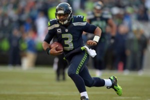 Seatlle vence 19-3 a los Cardenales Russell Wilson en un intento de carrera ante Arizona