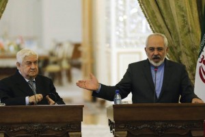 En rueda de prensa en Tehern, el canciller sirio, Walid al-Moallem, y su colega iran, Mohammad Jav